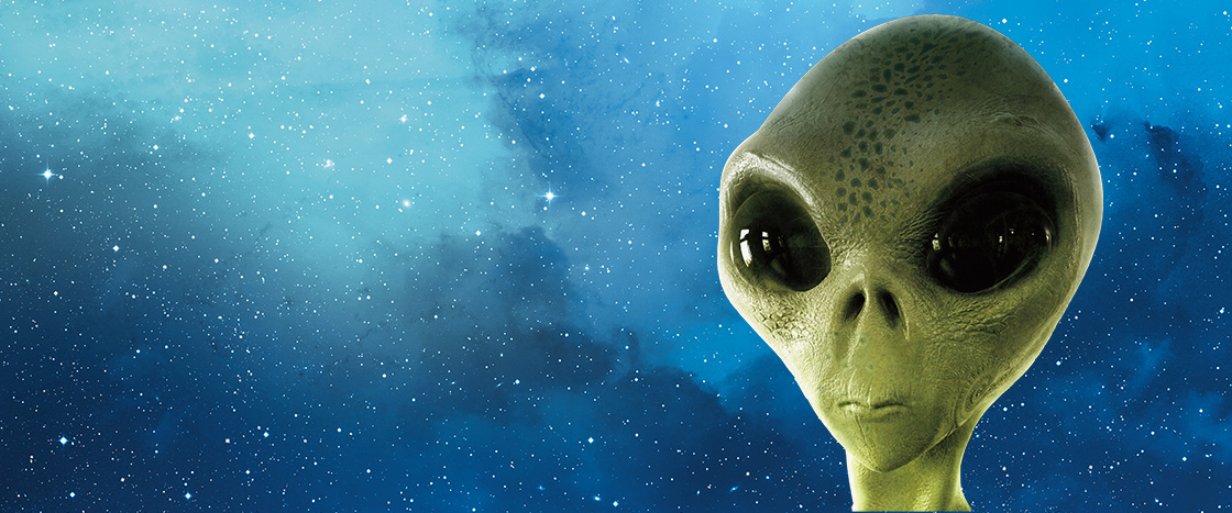 A green alien with large eyes in outer space