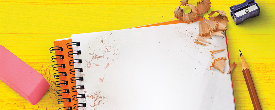 Image of a notebook, pencil, and eraser